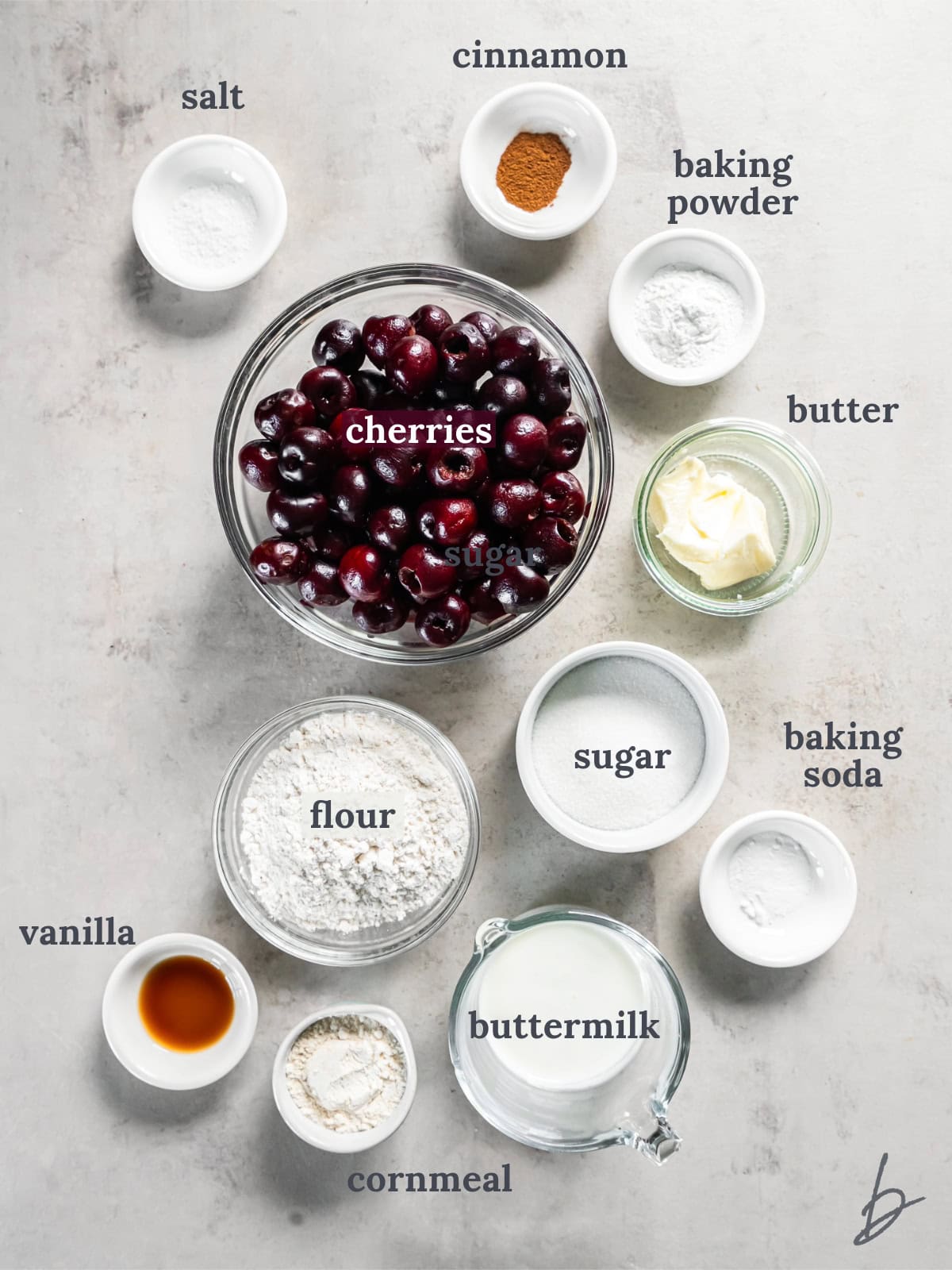 bowls of ingredients to make cherry cobbler.