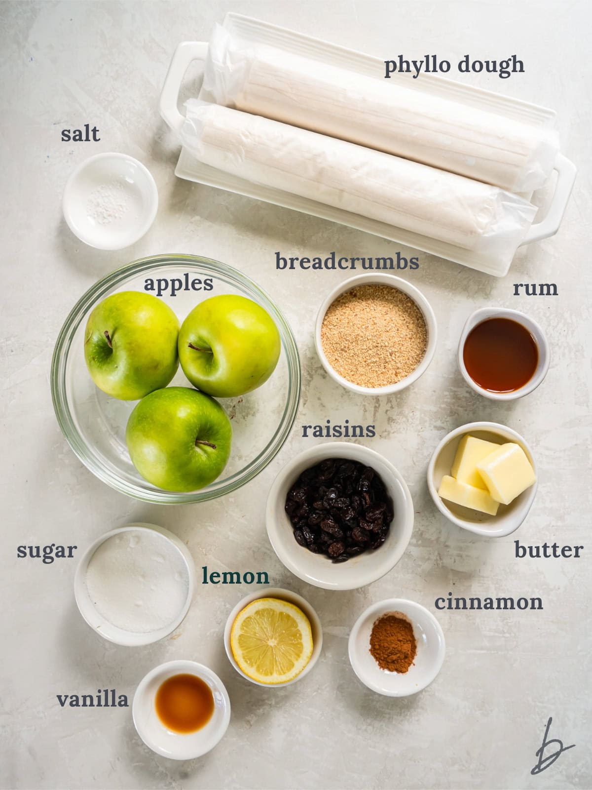 bowls of ingredients to make apple strudel.