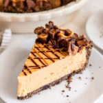 Slice of peanut butter pie on a white plate.