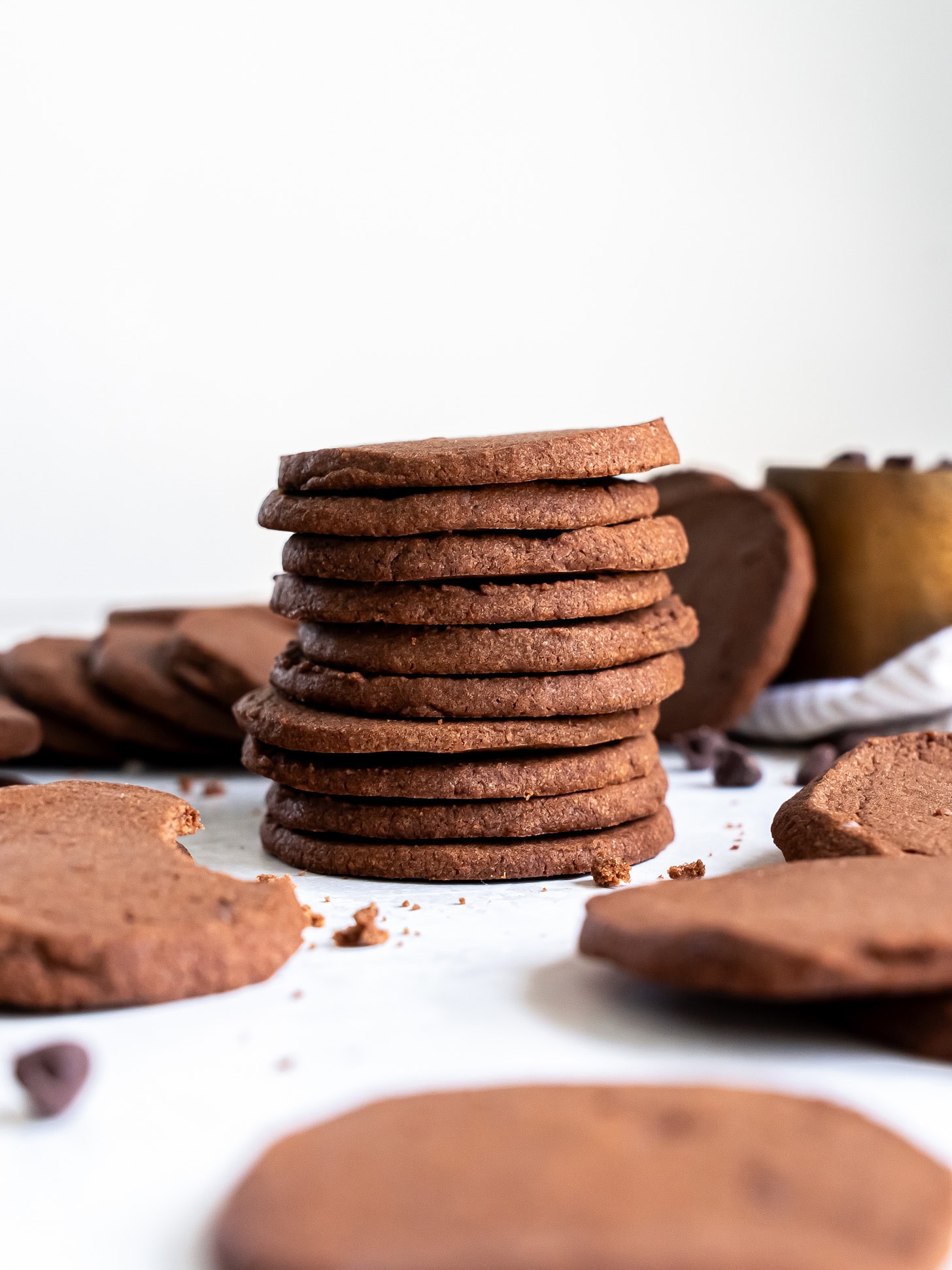 stack of chocolate icebox cookies profile view.
