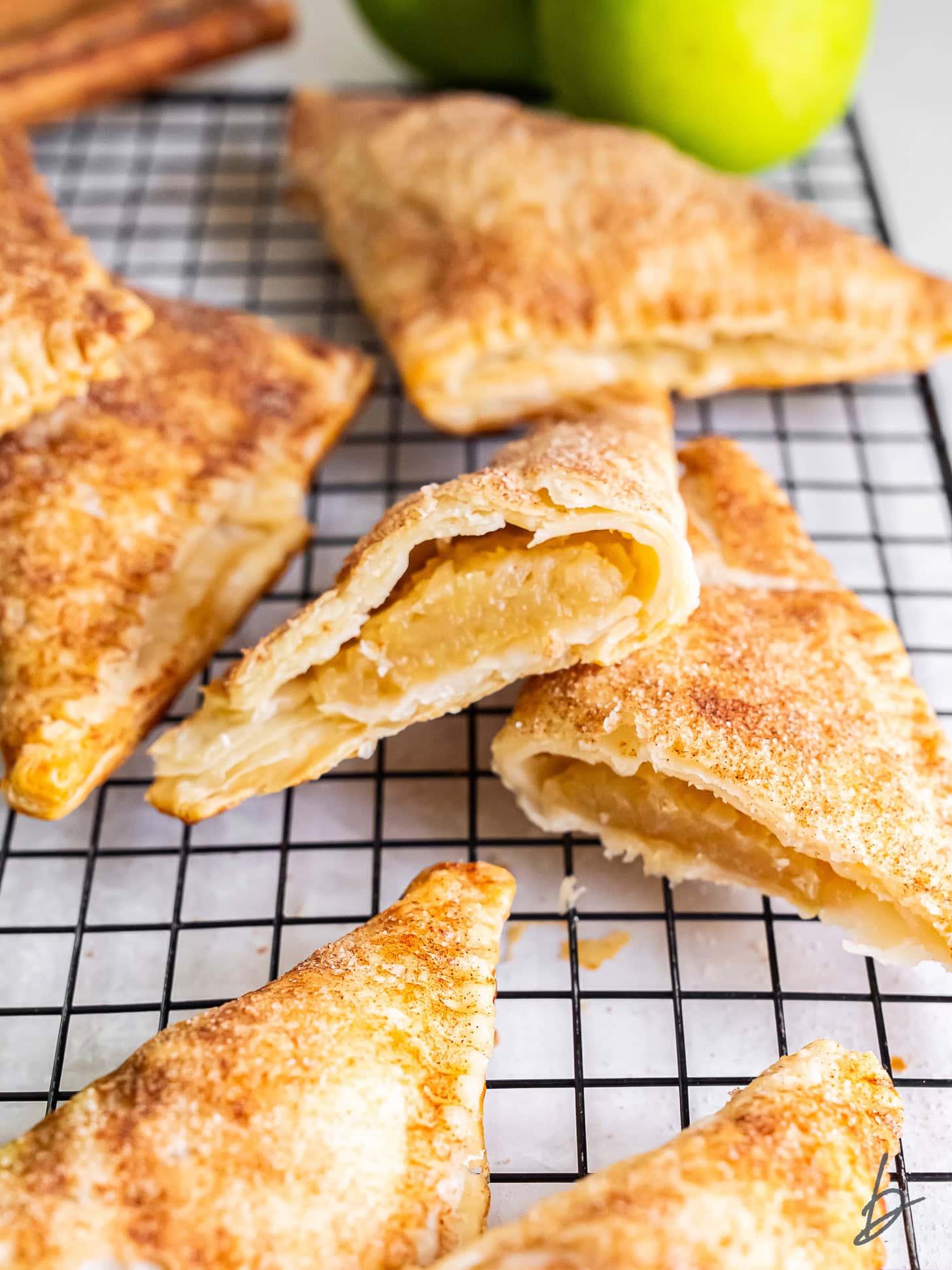 Easy apple turnovers cut in half to show the apple filling.