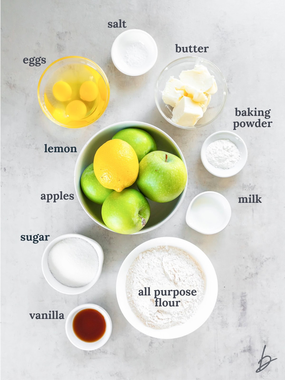 Bowls with apples, flour, sugar, butter and eggs.