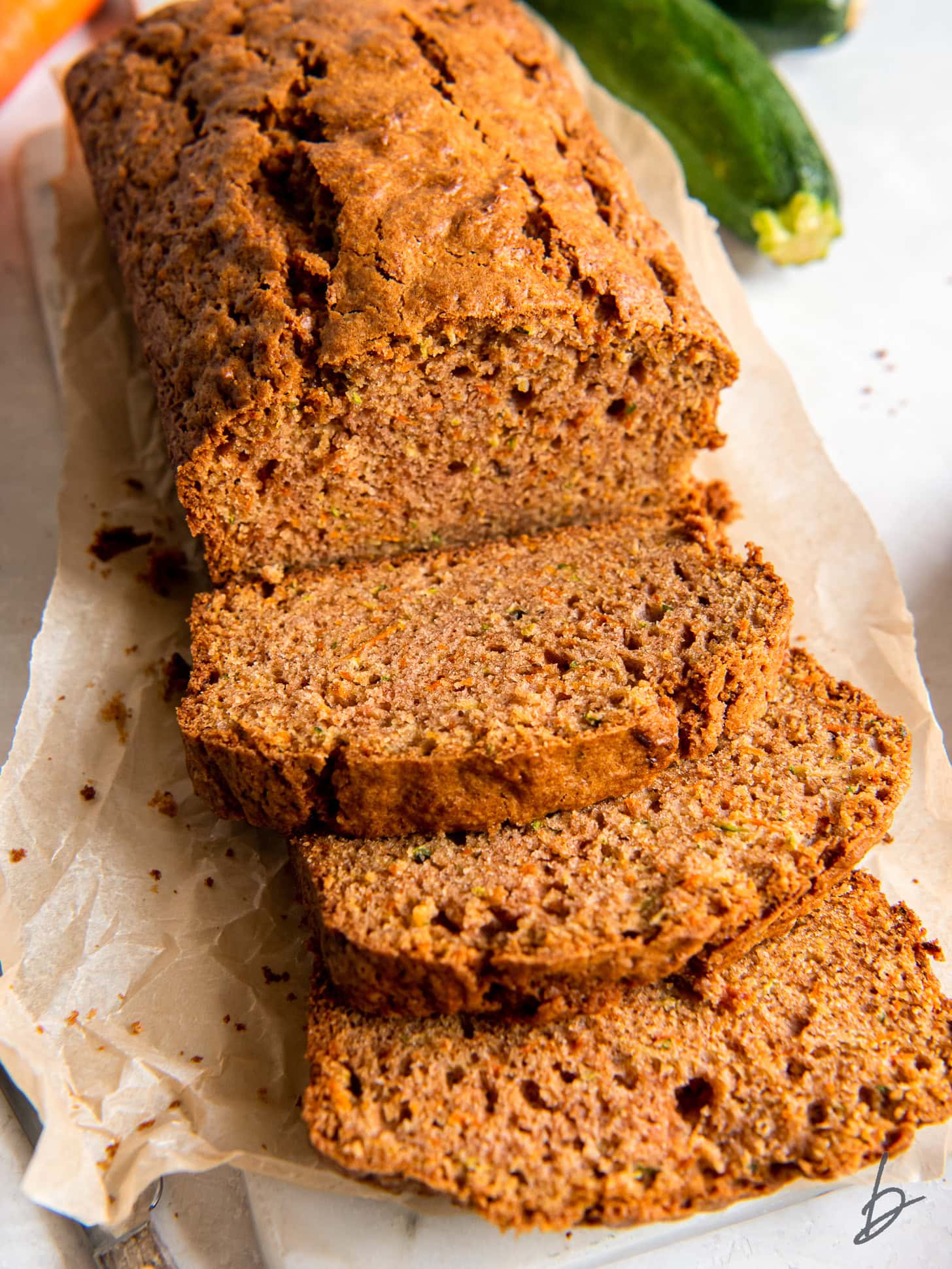 slices of zucchini carrot bread cut off the end of the loaf.
