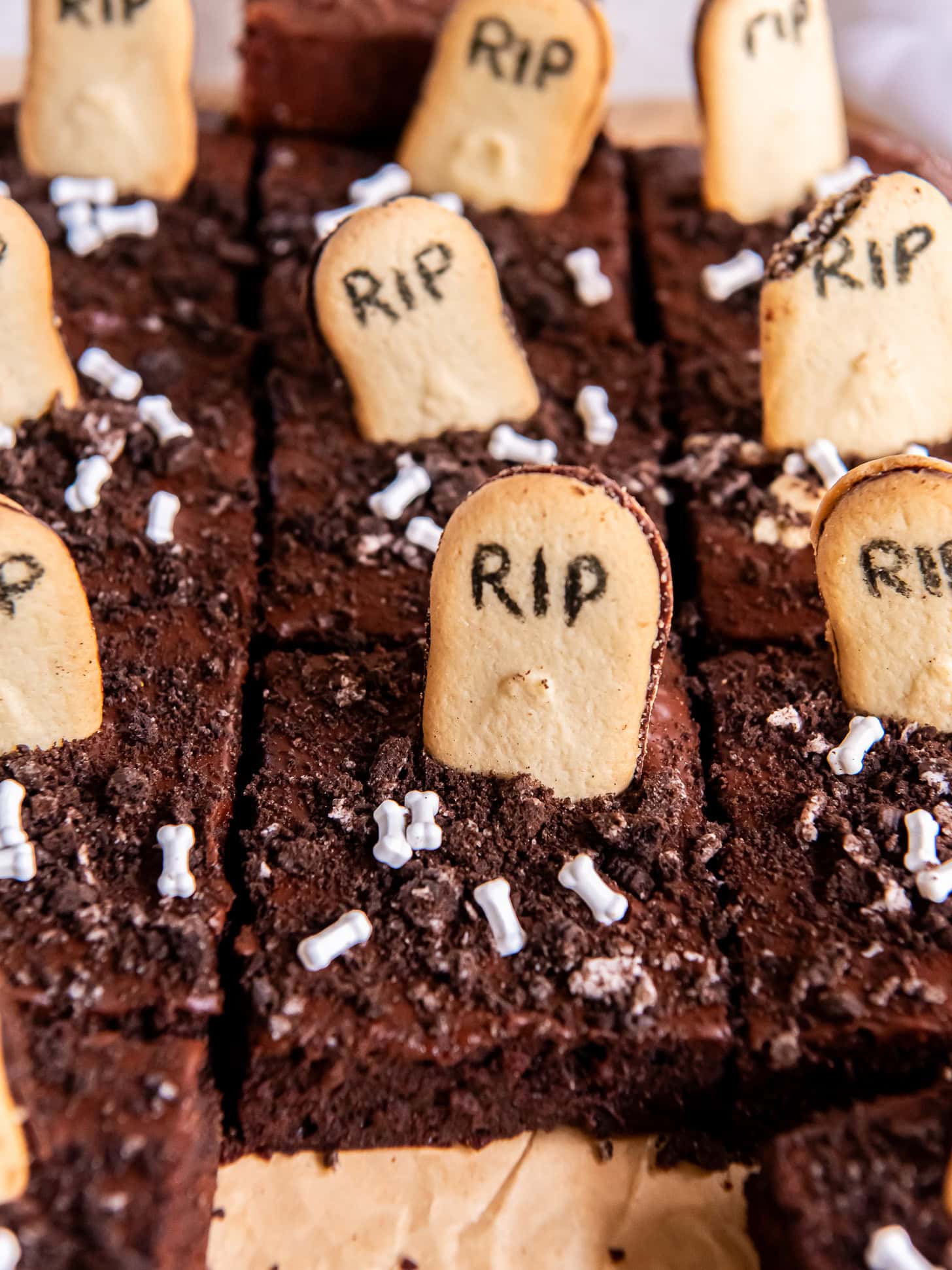Sliced graveyard brownies in a pan.