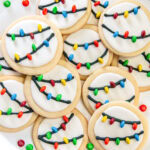 A plate filled with Christmas light cookies.