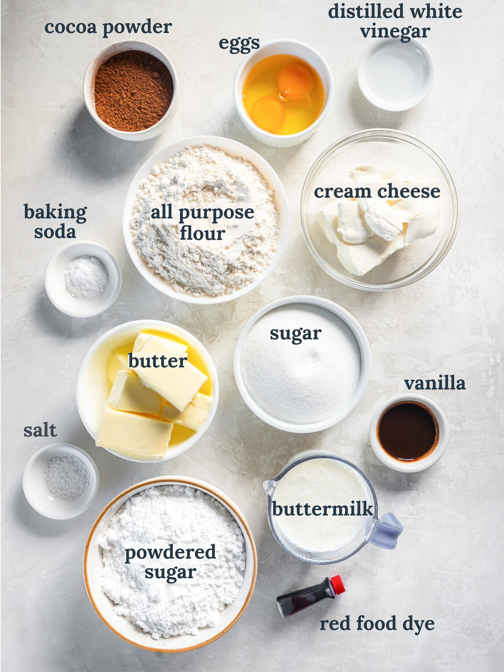 Bowls with flour, butter, sugar and cocoa powder.