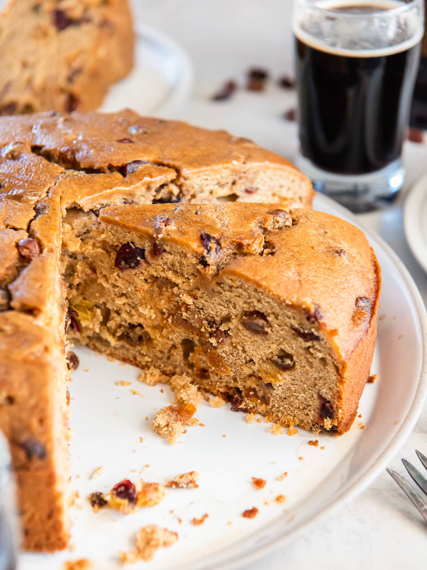 Irish porter cake with a slice taken removed.
