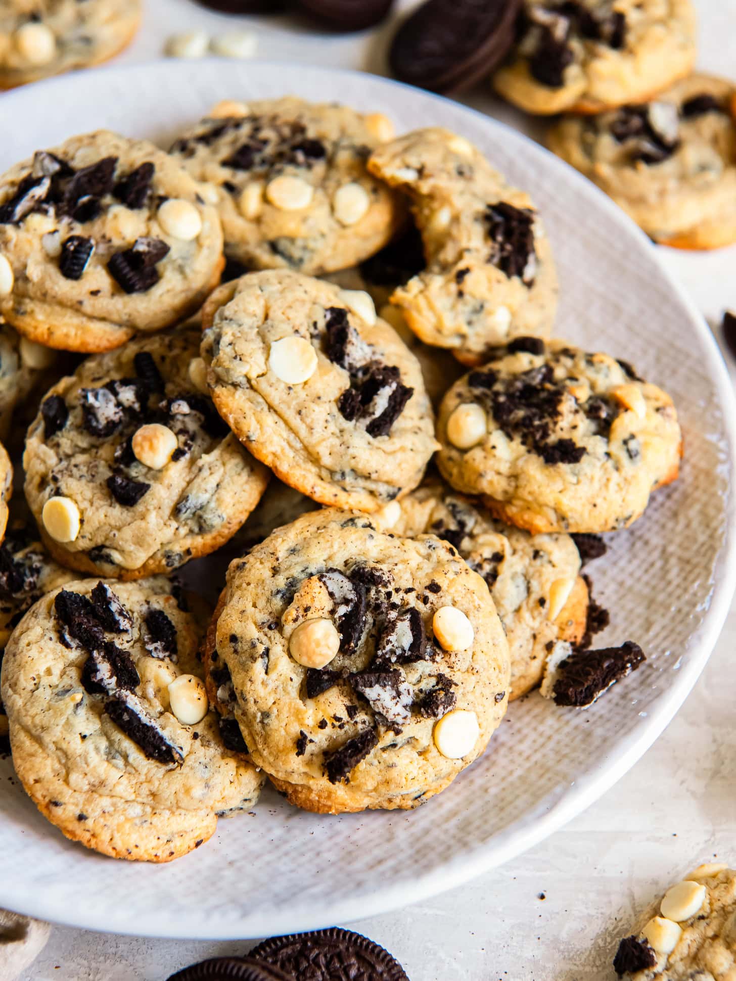 Cookies and cream cookies on a white plate.